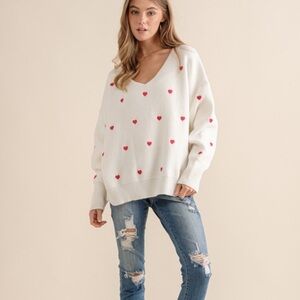 Heart sweater size s/m good condition